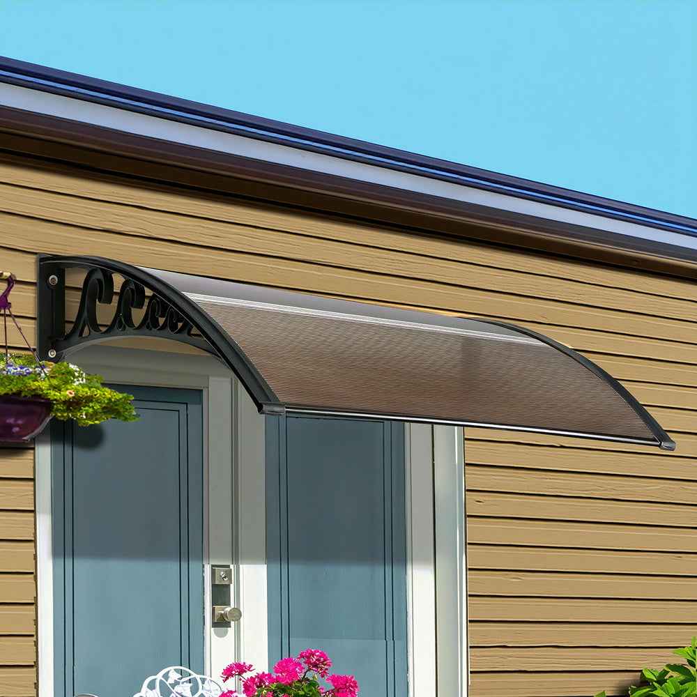 Brown window awning with curved black frame and side mounting brackets