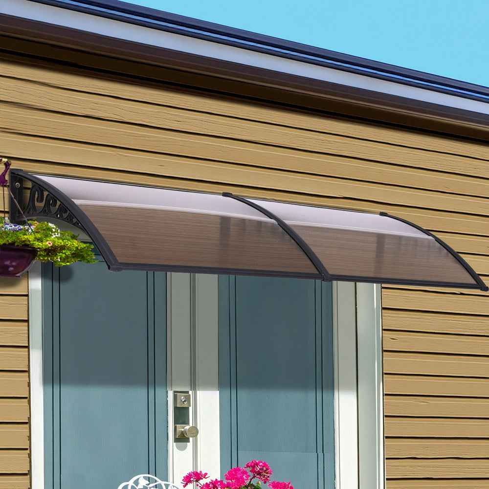 Installed curved awning under roof eave with brown fabric and black metal frame