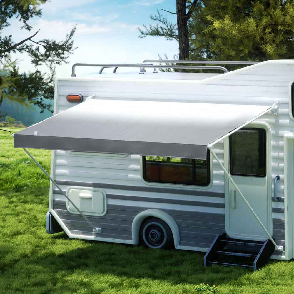 Installed RV awning fabric in light gray on caravan roof