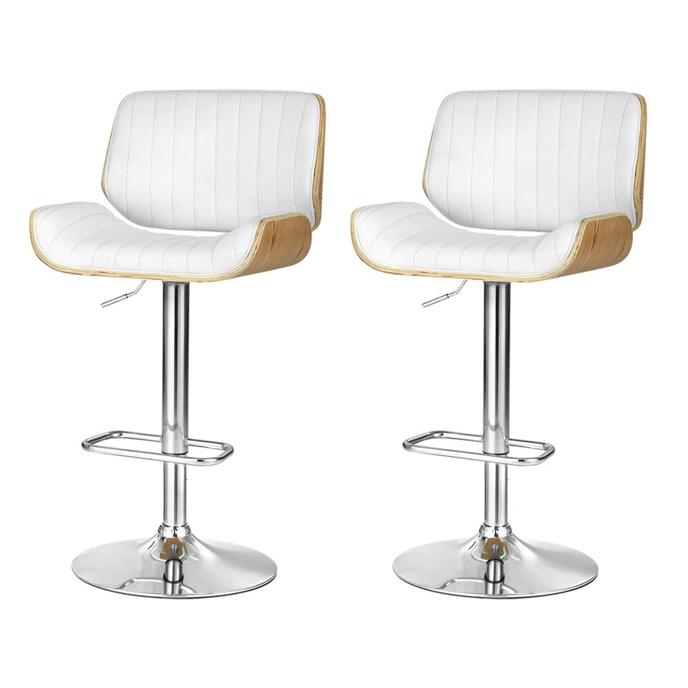 Two white bar stools with light wood sides, chrome pedestal and round footrest base