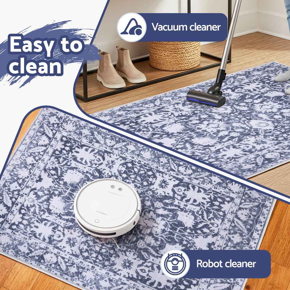 Blue and white patterned rug with flat pile, suitable for vacuum and robot cleaning