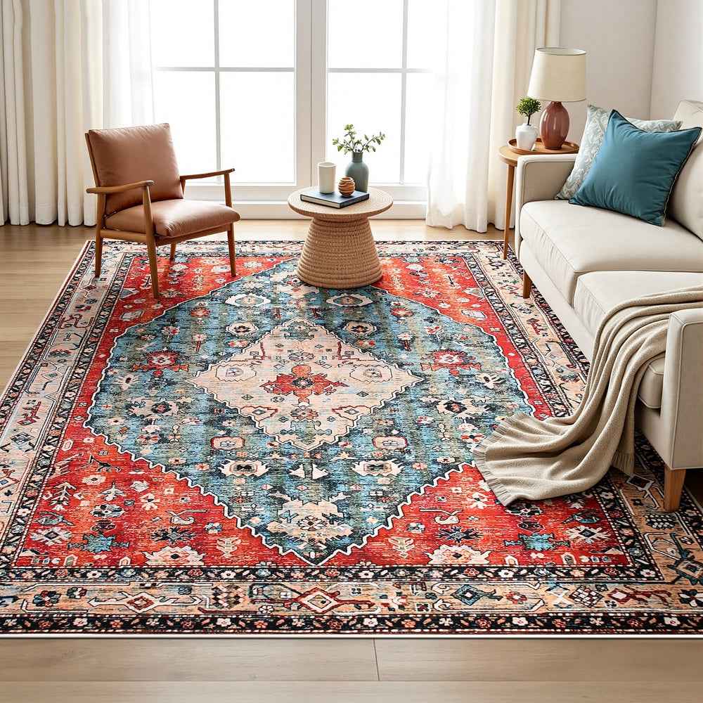 Large red, blue and cream medallion patterned area rug on light wood floor