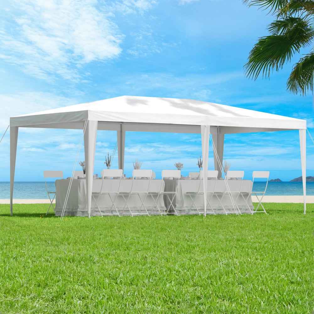 White 3x6m party marquee tent with peaked roof and hanging side curtains