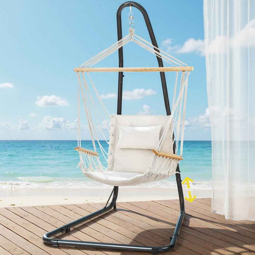 Hammock chair with white fabric seat, black steel stand, and hanging rope net