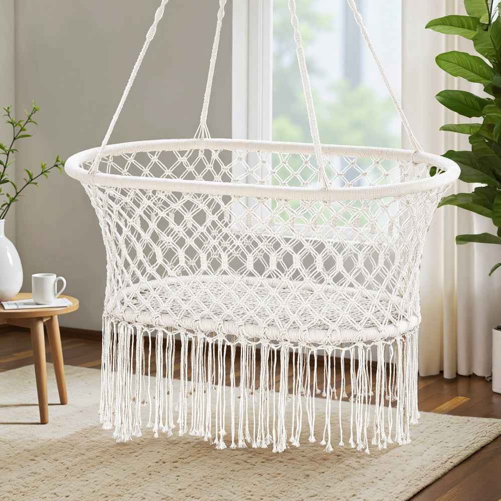 Cream rope hammock swing chair with diamond mesh seat and white tassel fringe