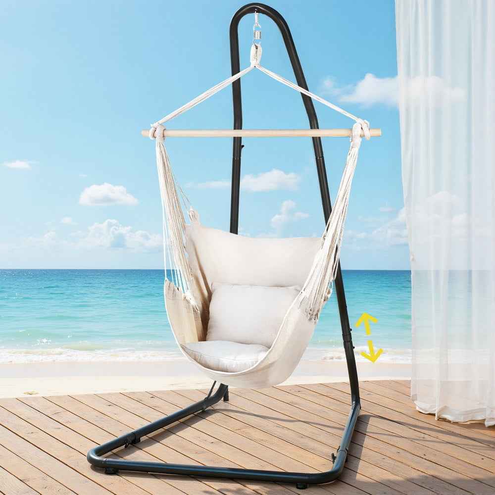 Hammock chair with cream fabric hammock and black steel stand, flat base