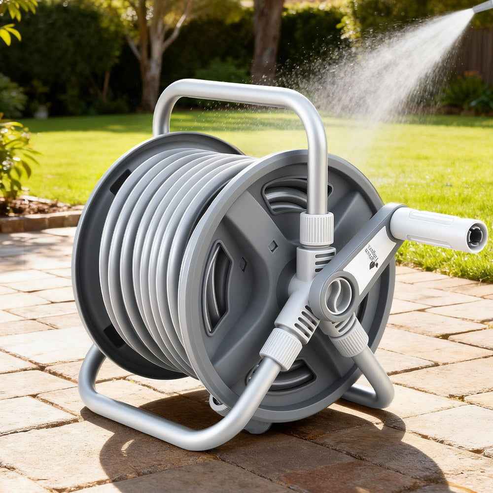 Retractable garden hose reel with coiled gray hose and white nozzle in silver frame