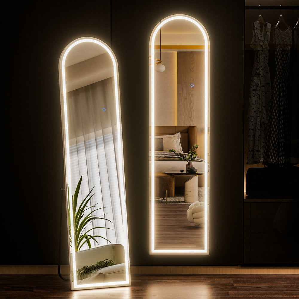 Full-length arched LED floor mirror with illuminated white border and reflective surface