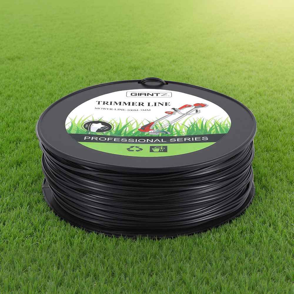 Black star trimmer line spool on grass with label on top