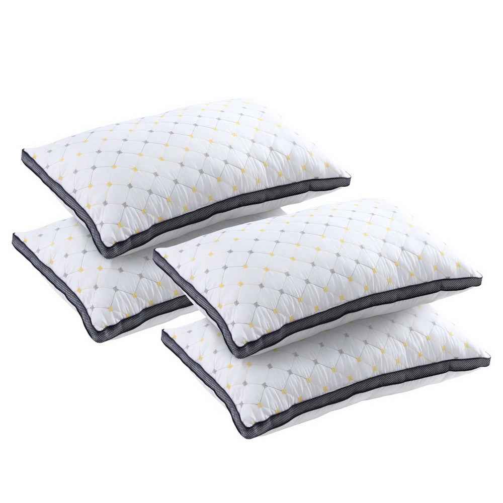 Giselle 4-piece microfibre pillow set, white quilted pillows with diamond stitching and gray trim.