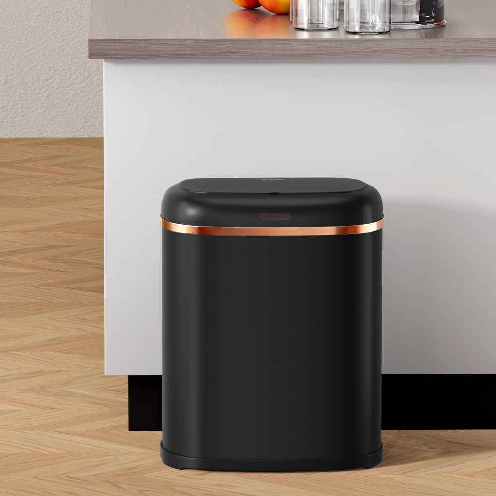 Black automatic motion sensor rubbish bin with copper-trimmed domed lid