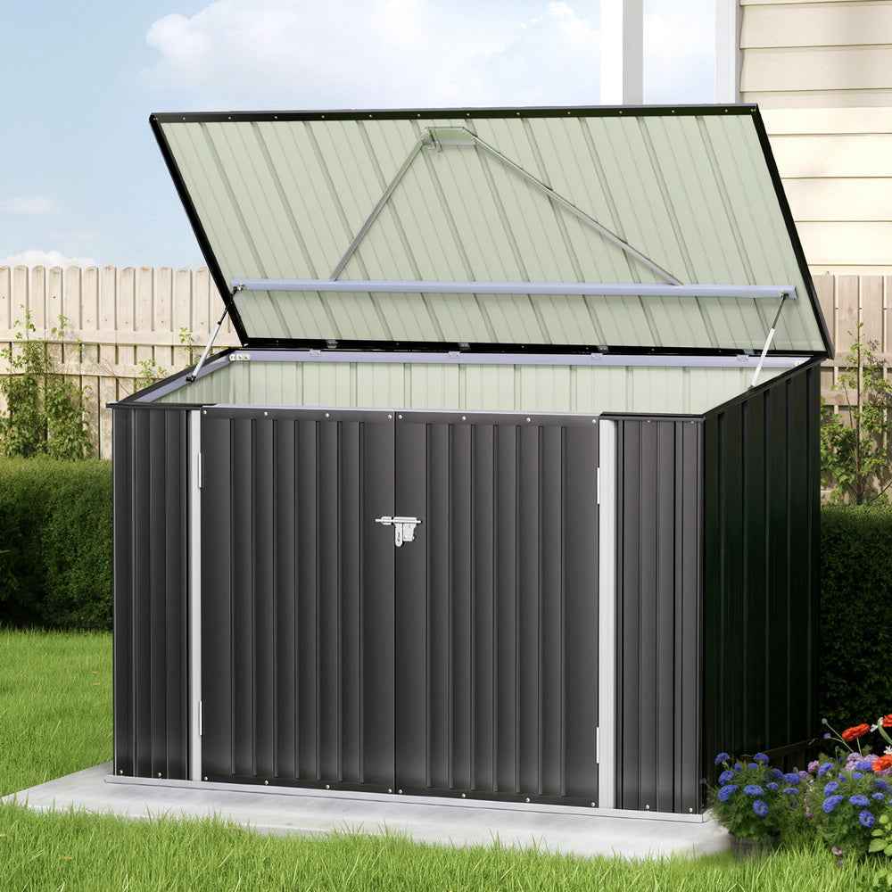 Outdoor storage shed with double doors, light beige side panels and dark metal roof