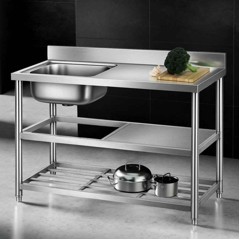 Stainless steel kitchen sink work table with splashback, two shelves, and drying rack