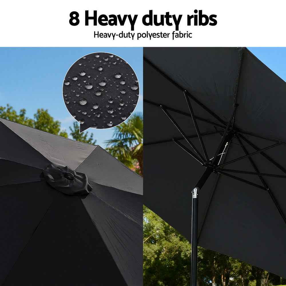 Black market umbrella canopy with heavy-duty ribs and water-resistant fabric detail.