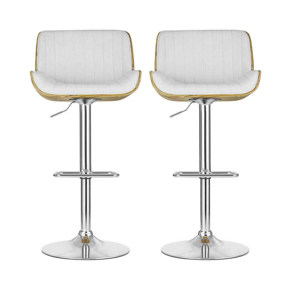 Set of two white upholstered bar stools with light wood armrests and chrome pedestal base