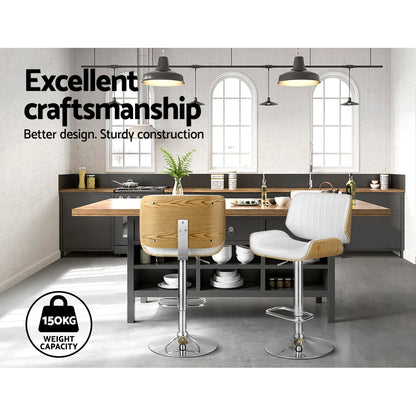Adjustable bar stool set with white padded seats, light wood panels, chrome pedestal bases