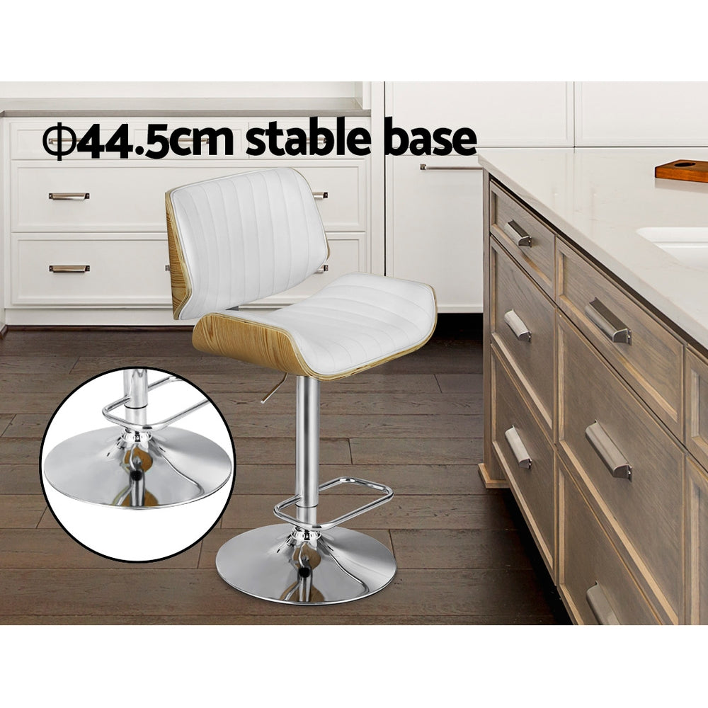 Adjustable bar stool with white padded seat, light wood trim, chrome round stable base
