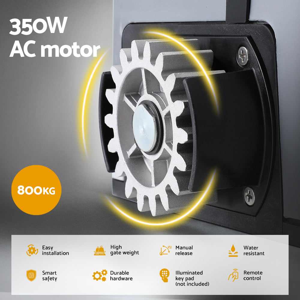 Gate opener motor drive wheel inside housing with illuminated ring graphic