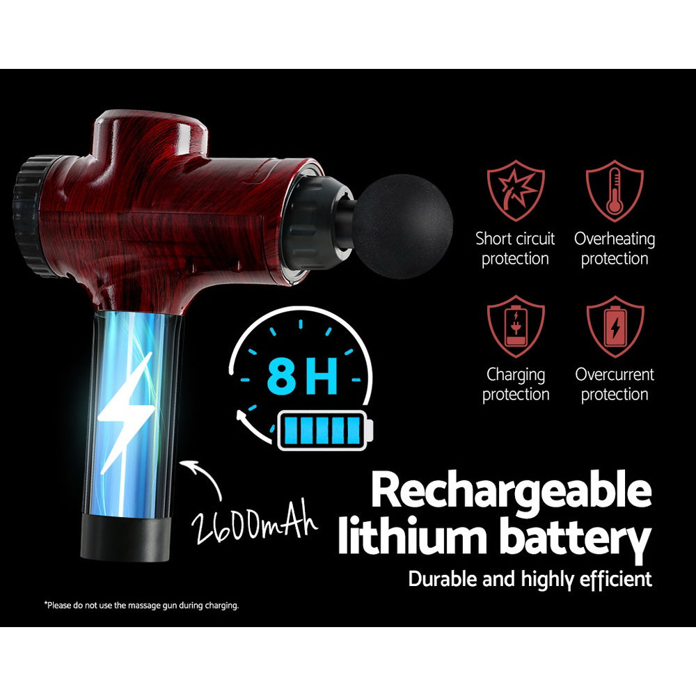 Red handheld rechargeable massage gun with round head and glowing battery indicator