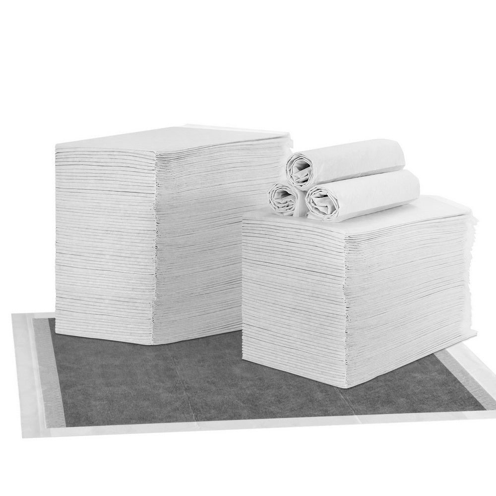 Pet training pads, grey absorbent squares, stacked pack of pads