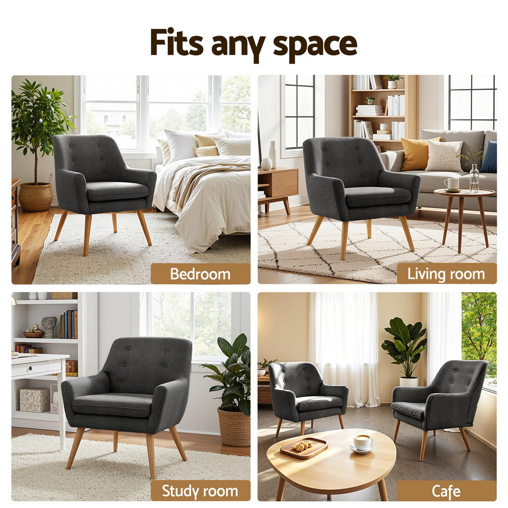 Charcoal upholstered armchair with tufted back and wooden legs